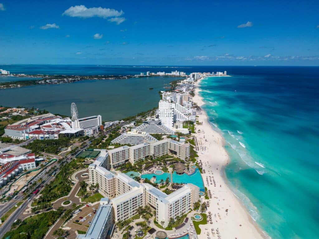 Stunning aerial view of Cancun's beachfront resorts along the vibrant turquoise waters.